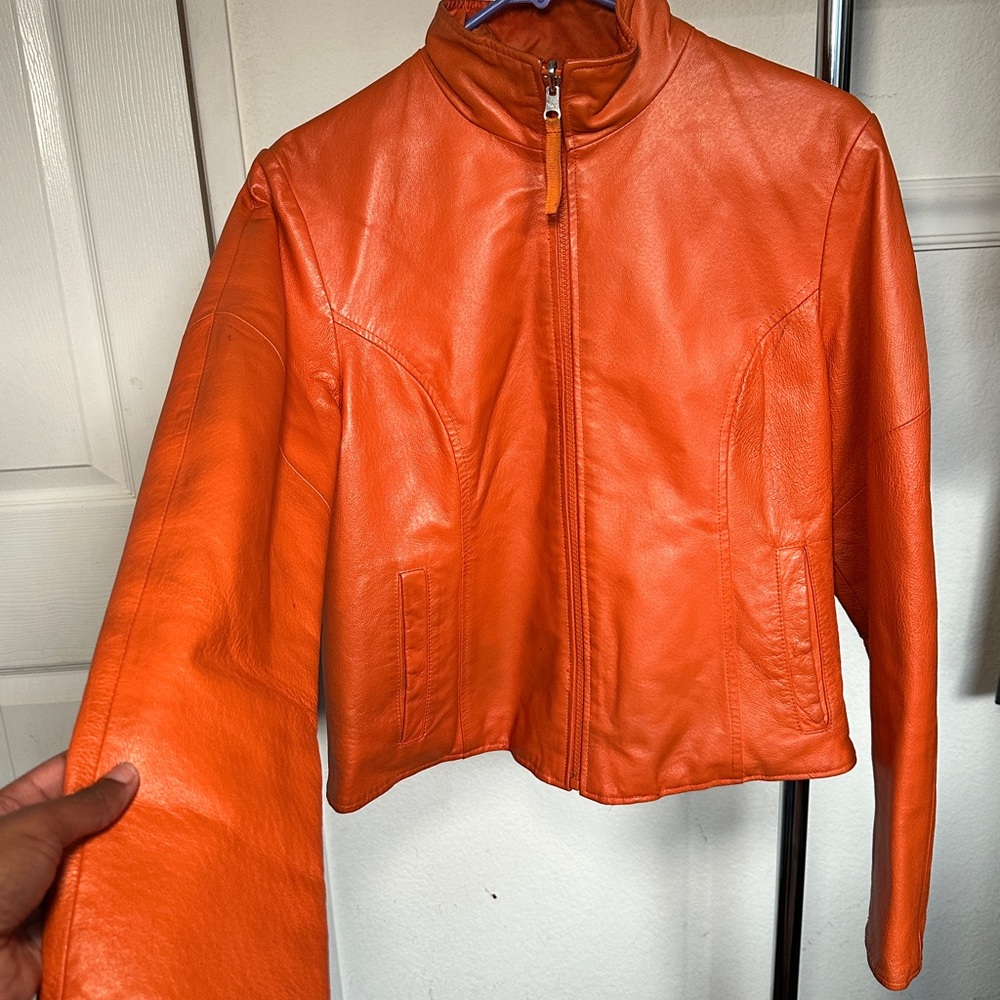 Wilson’s Leather Orange leather jacket ( Race car Aesthetic)